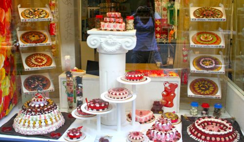 A window display of desserts in Switzerland.
