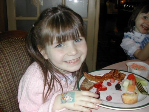 Child eating breakfast.