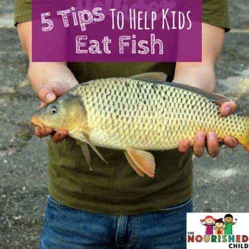 Child holding a fish. Help kids eat fish with these 5 tips! Also learn the best fish for beginners, which is the healthiest fish to eat, and the safest fish to eat for kids.
