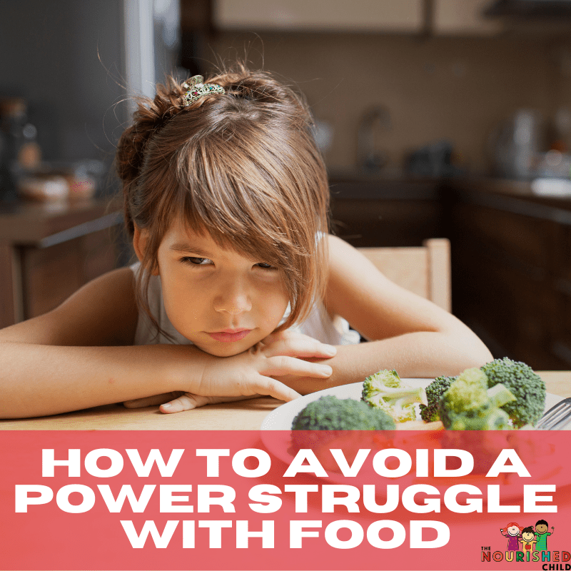 Little girl with a mealtime struggle over broccoli.